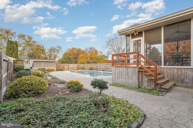 view of yard with a patio area, a fenced in pool, and a fenced backyard