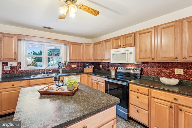 kitchen with visible vents, stainless steel electric stove, dark countertops, backsplash, and white microwave