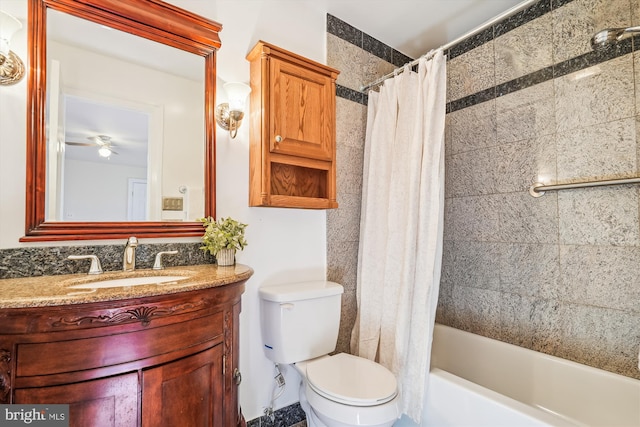 full bathroom with shower / tub combo, toilet, and vanity