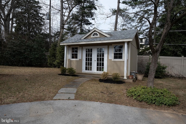 view of outdoor structure with an outdoor structure and fence