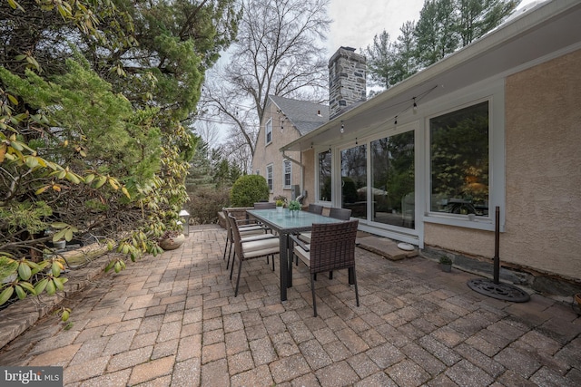 view of patio with outdoor dining area