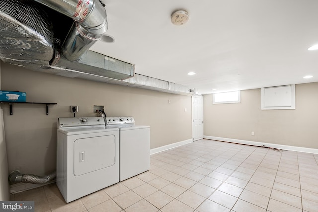 clothes washing area featuring laundry area, recessed lighting, and baseboards