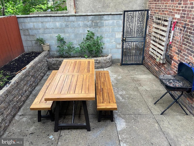 view of patio with fence