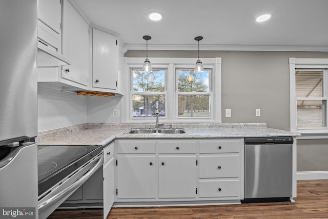 kitchen featuring a sink, white cabinetry, and stainless steel appliances