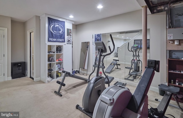 workout room with recessed lighting, baseboards, and carpet floors