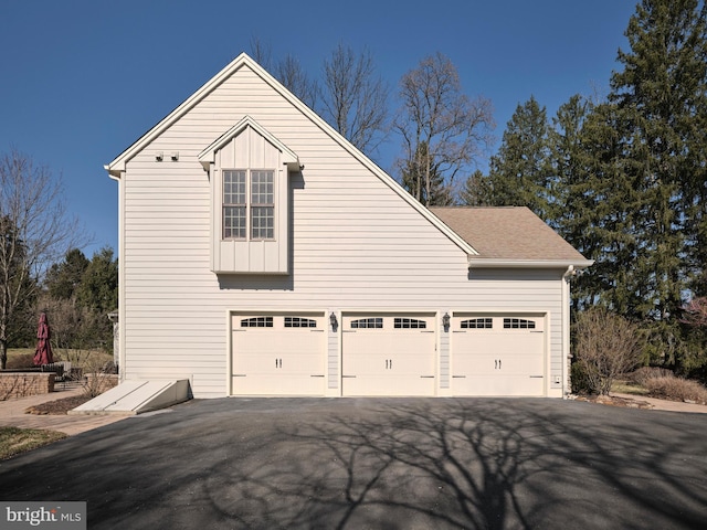 garage with driveway