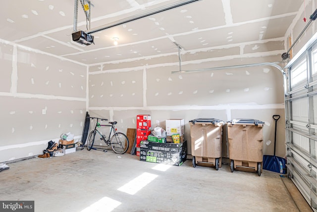 garage featuring a garage door opener