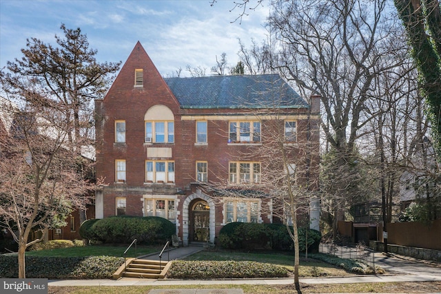 view of front of home with brick siding