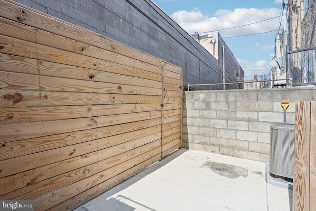 view of patio featuring cooling unit