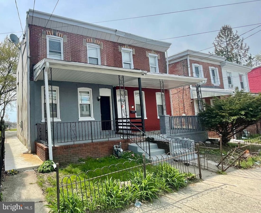 406 Highland Ave, Chester, PA 19013 - multi unit property with covered porch and brick siding