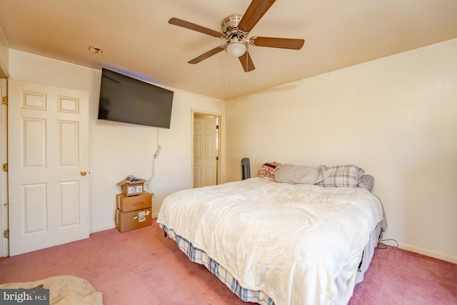 carpeted bedroom featuring a ceiling fan and baseboards