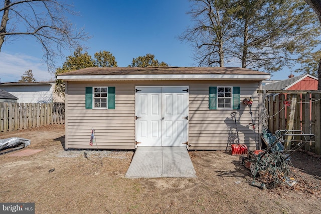 view of shed featuring a fenced backyard