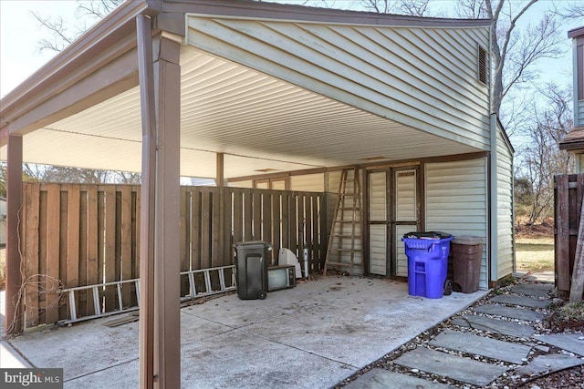 view of patio / terrace featuring fence