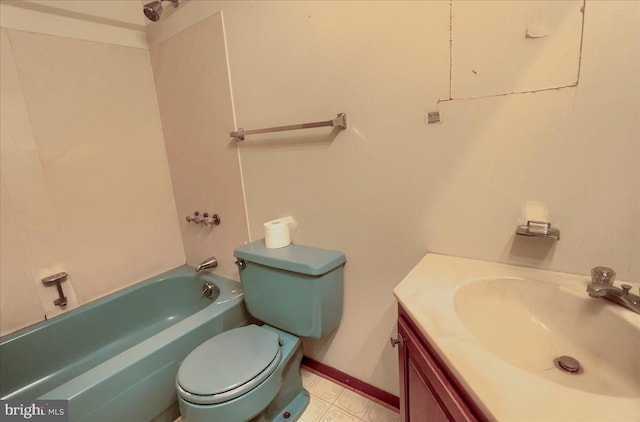 full bathroom featuring vanity, toilet, and baseboards