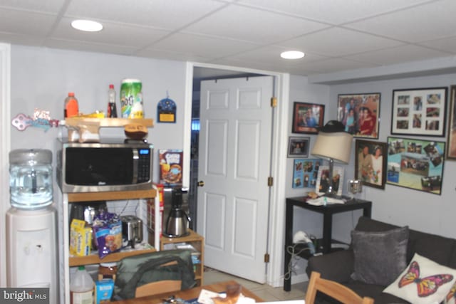 interior space with recessed lighting and a drop ceiling