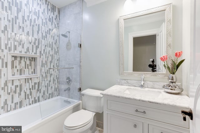 bathroom with shower / bathing tub combination, toilet, and vanity