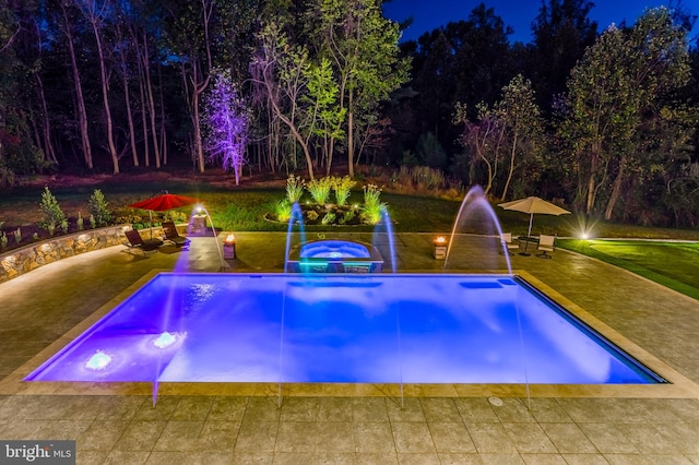 outdoor pool featuring a patio