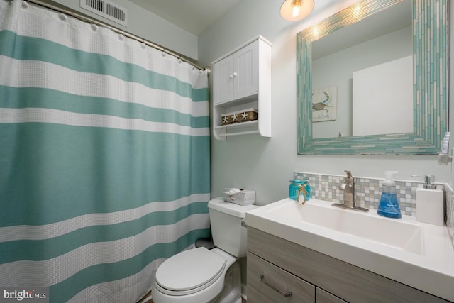 full bath featuring visible vents, toilet, curtained shower, decorative backsplash, and vanity