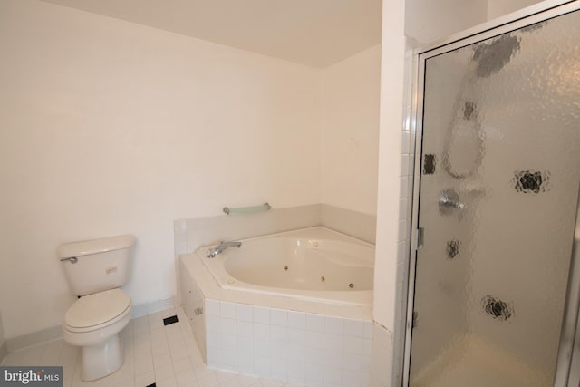 full bathroom featuring tile patterned floors, toilet, a tub with jets, and a stall shower