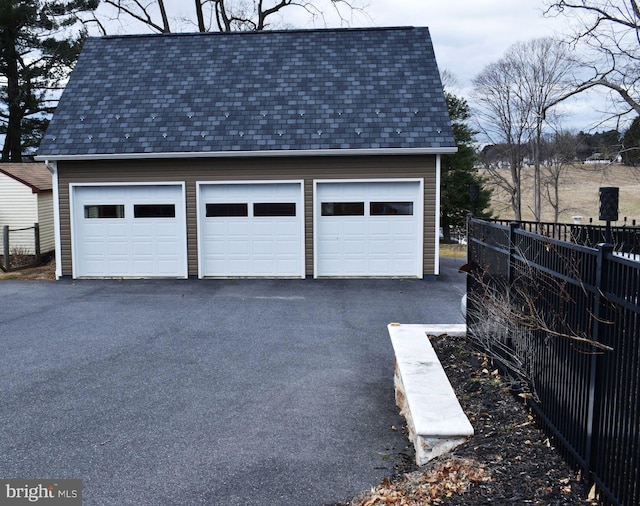 detached garage with fence