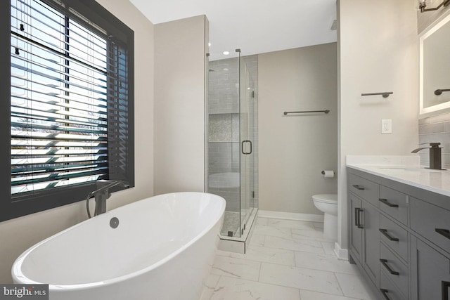 full bath featuring baseboards, toilet, a stall shower, marble finish floor, and vanity