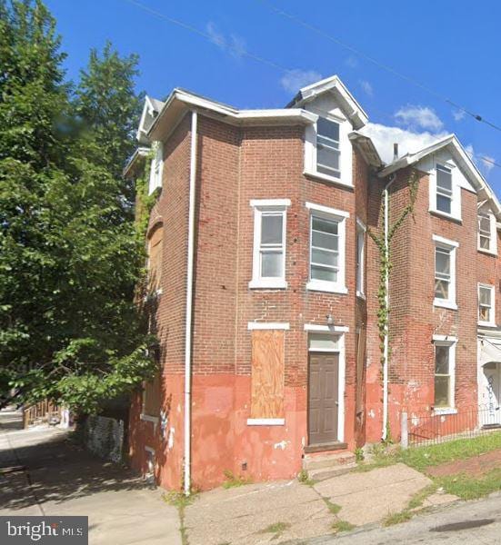 multi unit property featuring brick siding