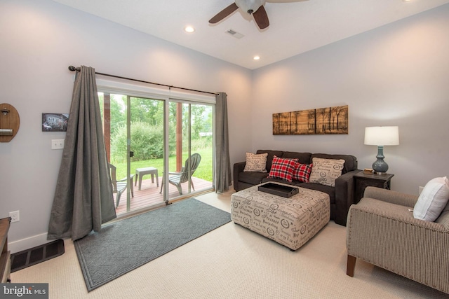 carpeted living area with recessed lighting, visible vents, baseboards, and ceiling fan