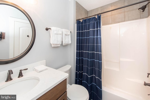 full bathroom featuring toilet, vanity, and shower / bath combination with curtain