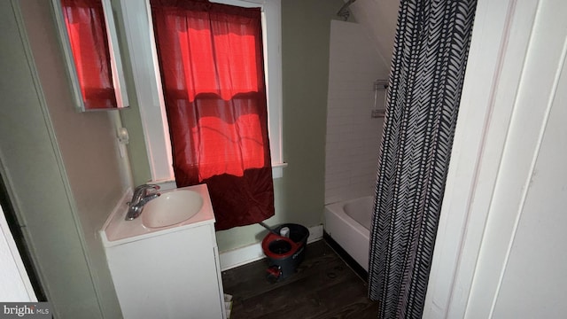 28 Harding Ave, Pennsville, NJ 08070 - bathroom with vanity, wood finished floors, and shower / bath combo with shower curtain