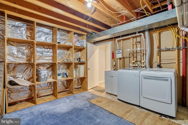 unfinished basement with washer and dryer