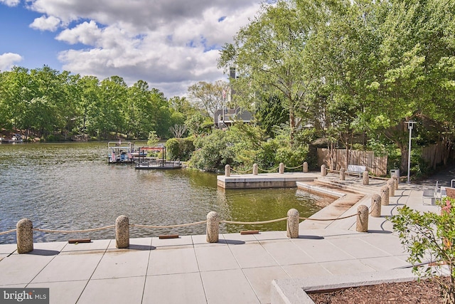 view of dock with a water view