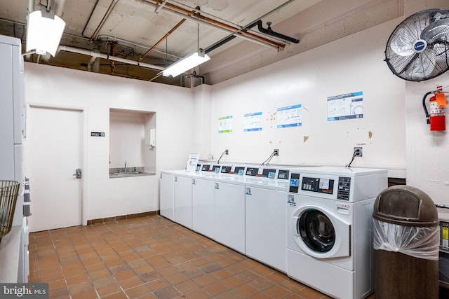 shared laundry area with washer and dryer