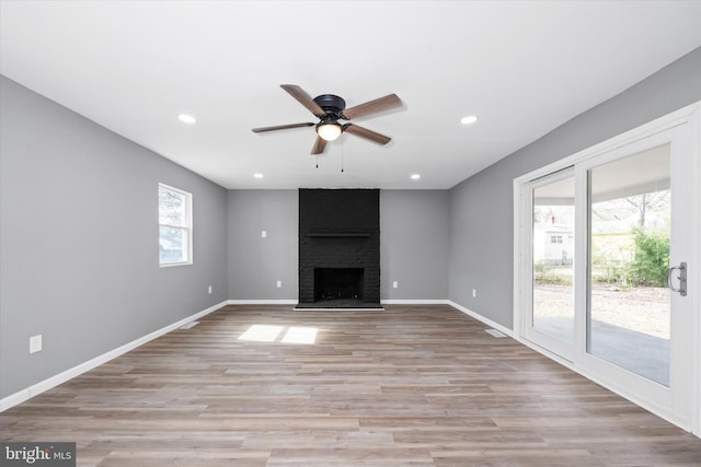 unfurnished living room featuring light wood-style flooring, recessed lighting, baseboards, and ceiling fan