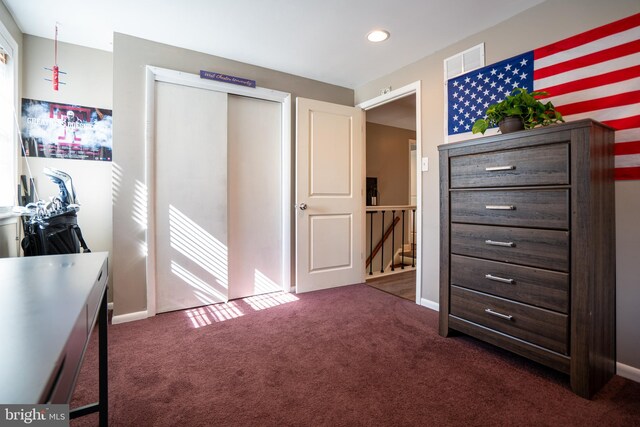 unfurnished bedroom with baseboards, visible vents, carpet floors, recessed lighting, and a closet