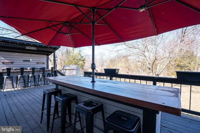 deck with outdoor dry bar