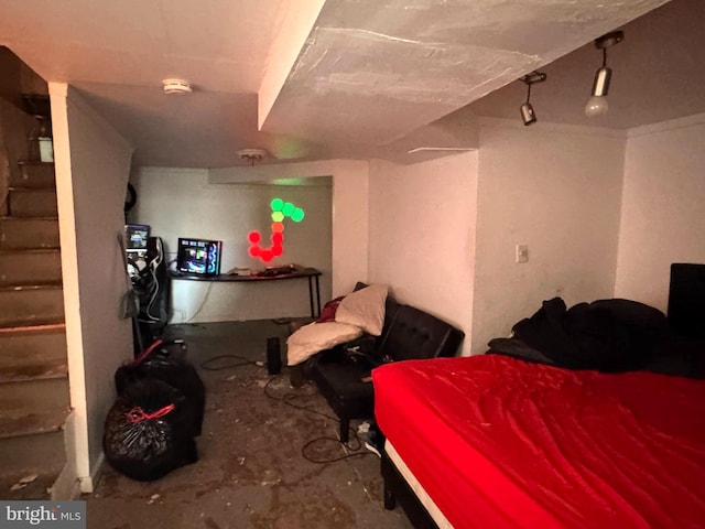 bedroom featuring concrete floors