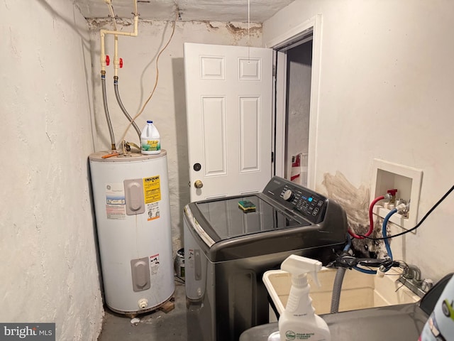 laundry room featuring laundry area, washer / clothes dryer, and water heater