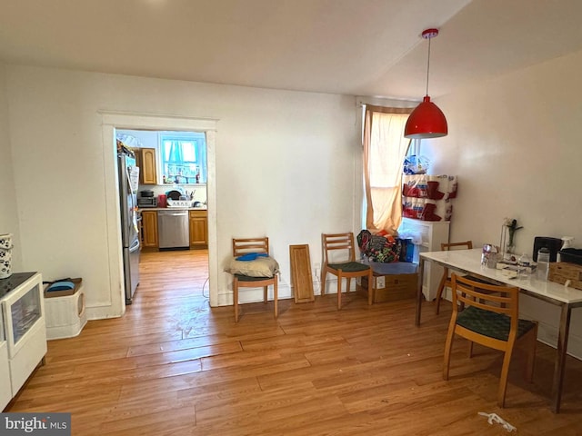 interior space with light wood-style floors and a wealth of natural light