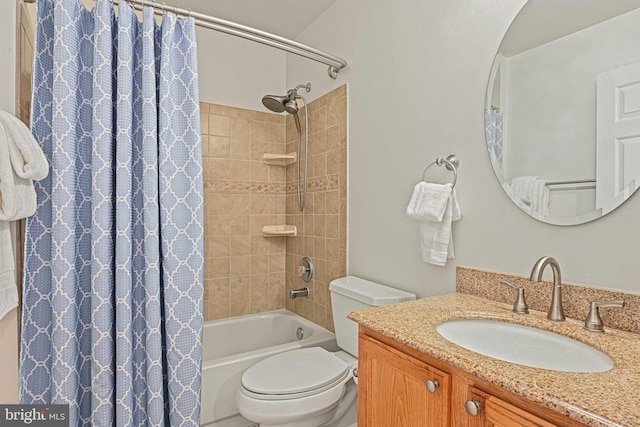 full bath featuring vanity, toilet, and shower / bath combo with shower curtain