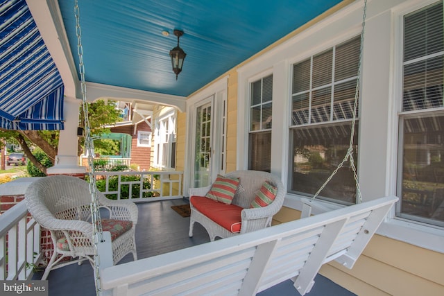 wooden deck featuring a porch