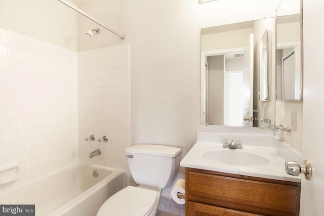 full bath featuring shower / bathtub combination, toilet, and vanity