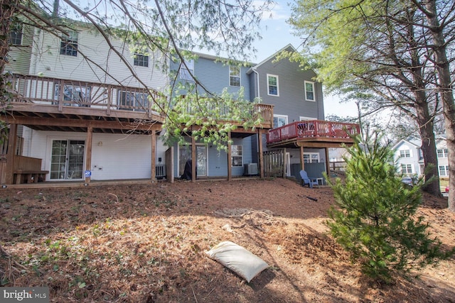 rear view of property with a deck