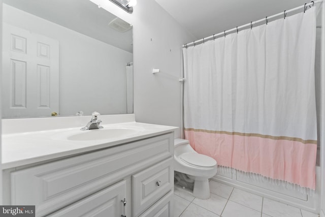 bathroom featuring vanity, tile patterned floors, toilet, and shower / bathtub combination with curtain