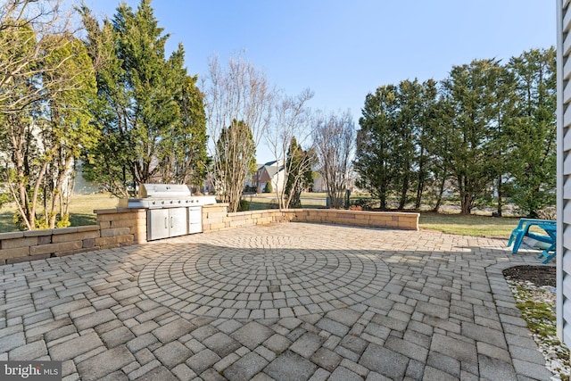 view of patio featuring grilling area and an outdoor kitchen