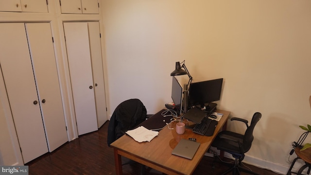 home office with wood finished floors