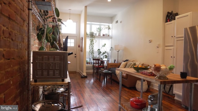 living area with dark wood-type flooring