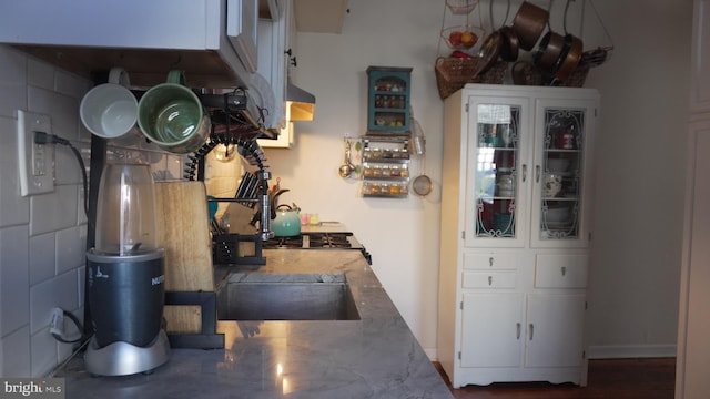 kitchen with white cabinetry