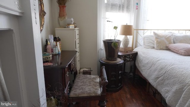 bedroom featuring wood finished floors