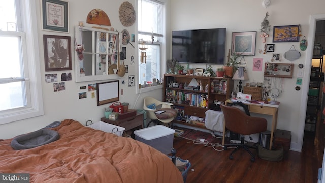 bedroom featuring wood finished floors