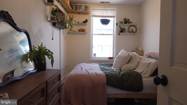 bedroom with visible vents